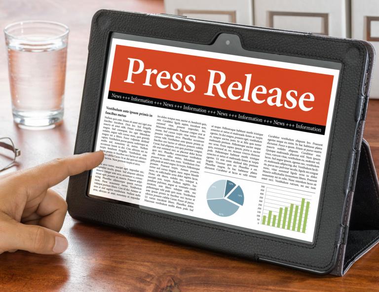 press release on tablet